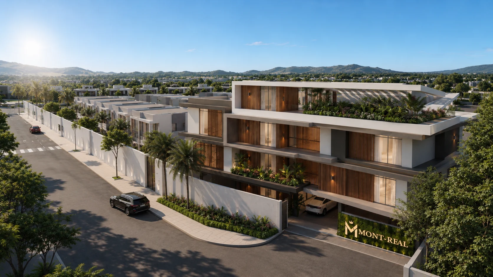 Vista aérea del condominio Mont-Real Villas con ingreso principal y áreas residenciales
